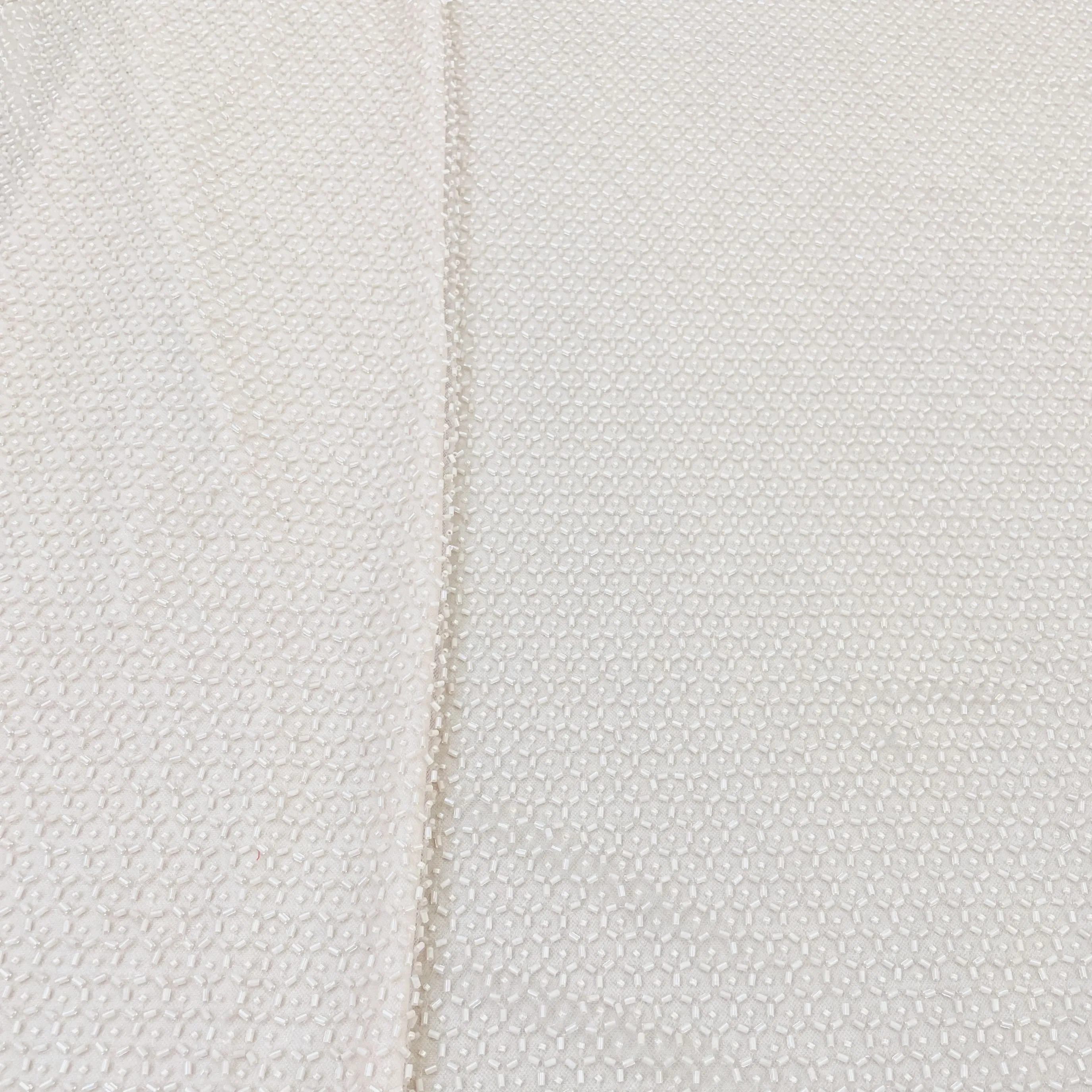 Exclusive Peach Pink Imported Beads Embroidery Net Fabric